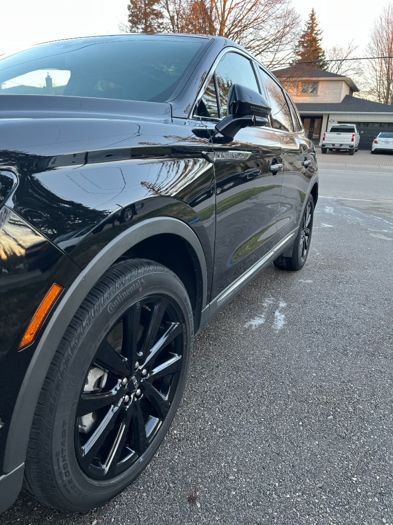 Shiny clean car wheel after detailing